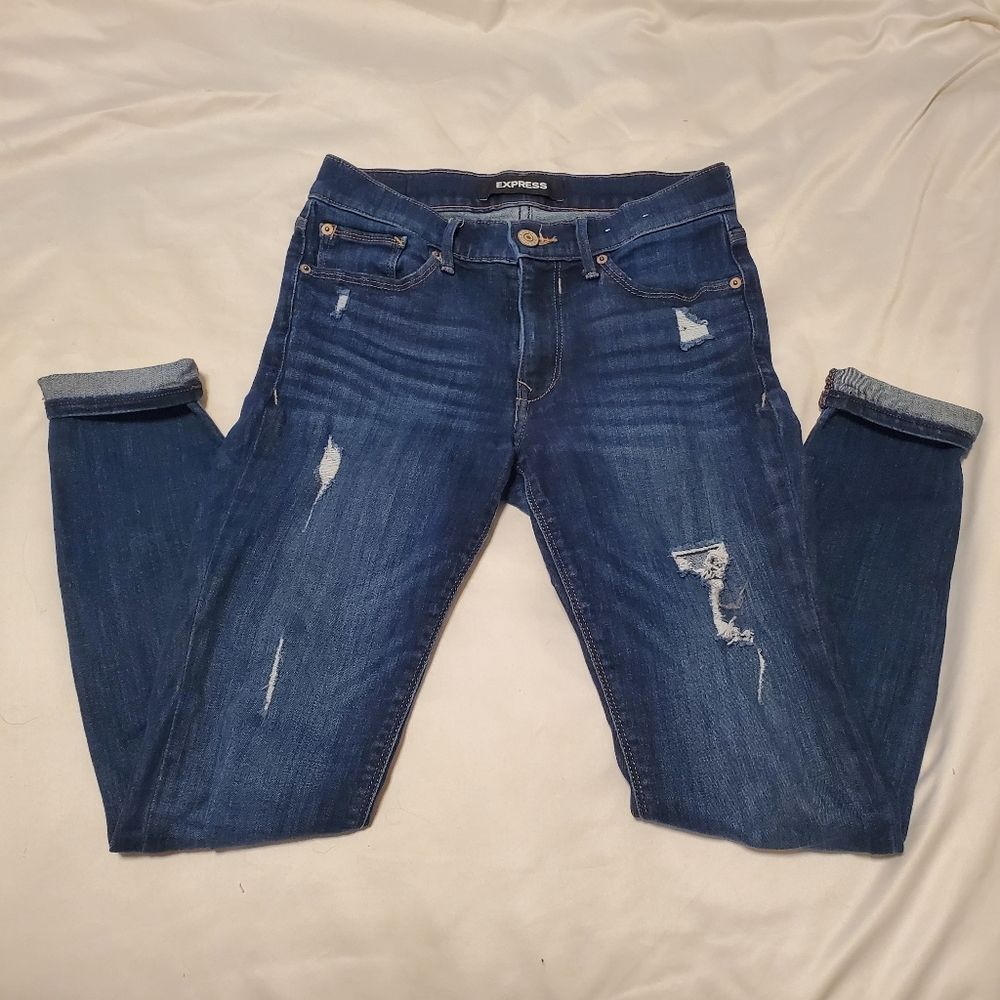 Dark wash lightly distressed jeans